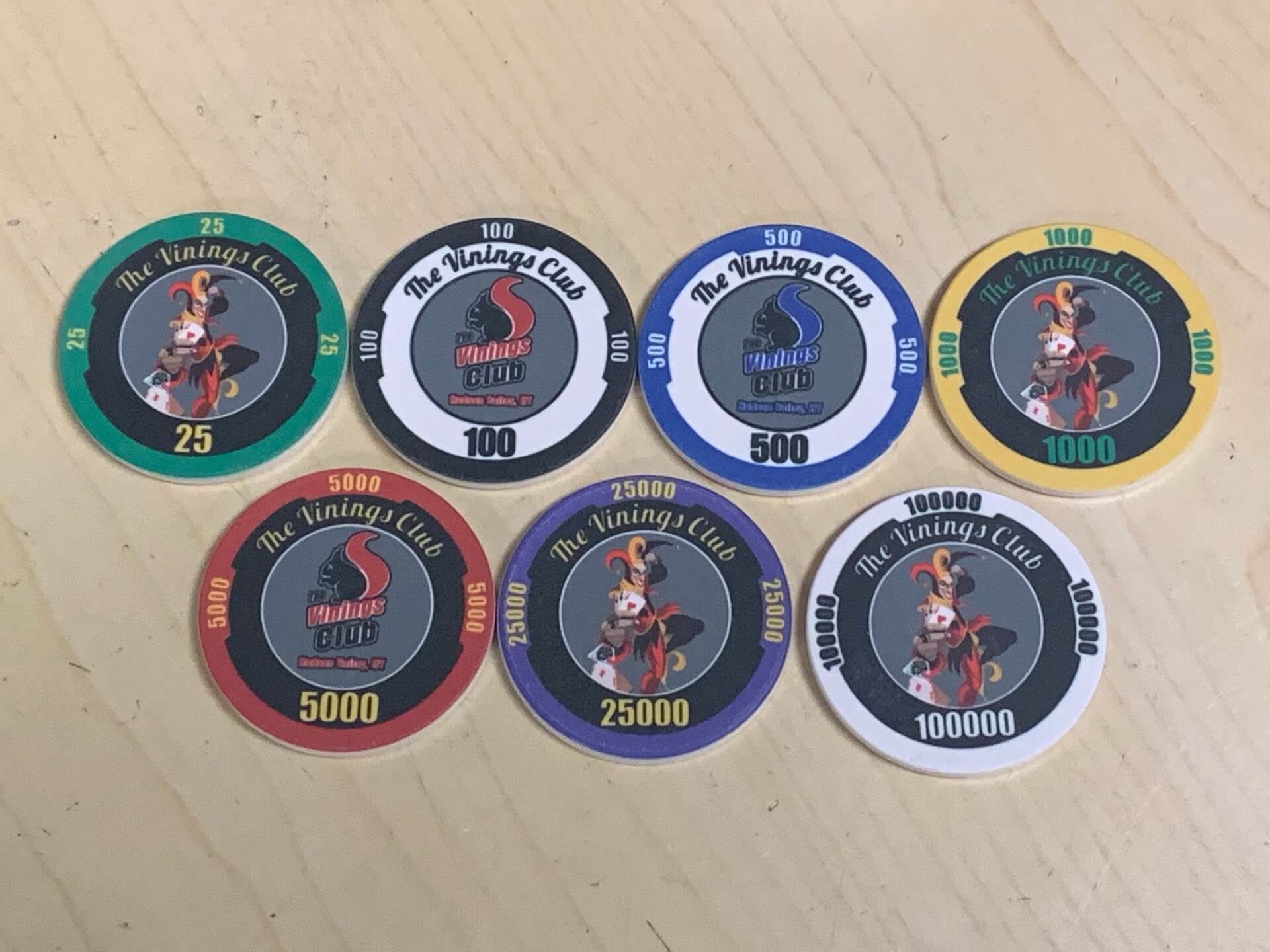 Custom Chips for Card Room Client - Rick Stockfield - Vinings Club Chips - Complete custom designed poker chip set made for the Vinings Card Club by Aurora Poker Gear. Features various ceramic polymer chip denominations with custom edges, inlays, and unique center graphics of their "Blind Squirrel" logo.