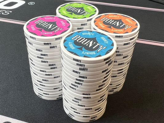Four stacks of 20 designer Havoc Bounty poker chips. Available in four colors: lime green, torrid pink, caribbean blue, and burnt orange. All four colors have matching white rolling edges and the word "bounty," so your players can easily tell them apart.