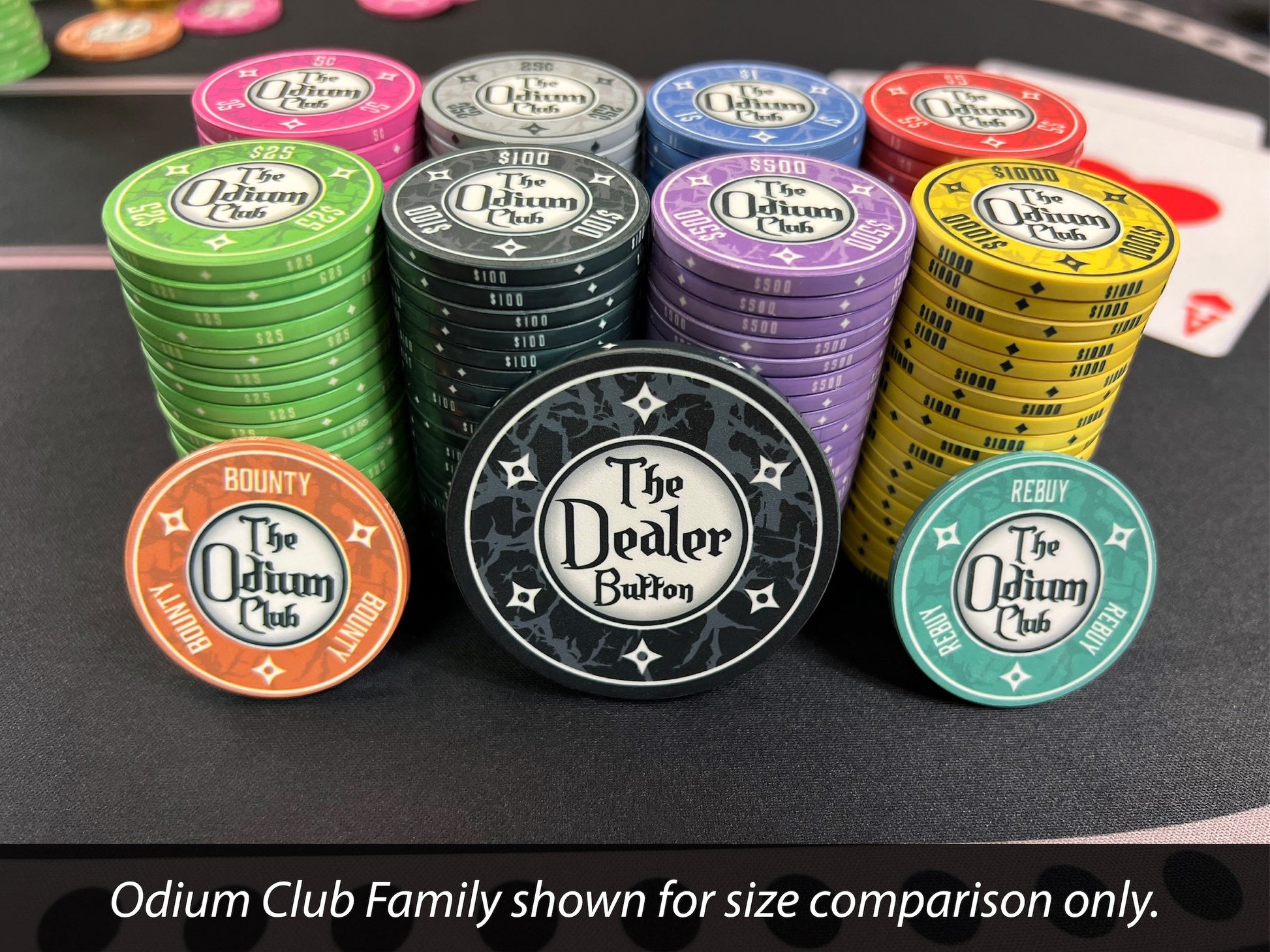 Shown here are all 8 denominations of Odium Club poker chip in stacks, the Odium Club Rebuy 43mm chip, the Odium Club Bounty 43mm chip, and the 60mm (2.36 inch) Odium Club Dealer Button. The 39mm chips and the 43mm bounty and rebuy chips are 3.3mm thick--which is the standard poker chip thickness. The dealer button is .223-inch or 5.66mm thick. Available in 5¢ pink, 25¢ gray, $1 blue, $5 red, $25 green, $100 black, $500 purple, and $1000 yellow. Few offer matching poker chips and dealer buttons.